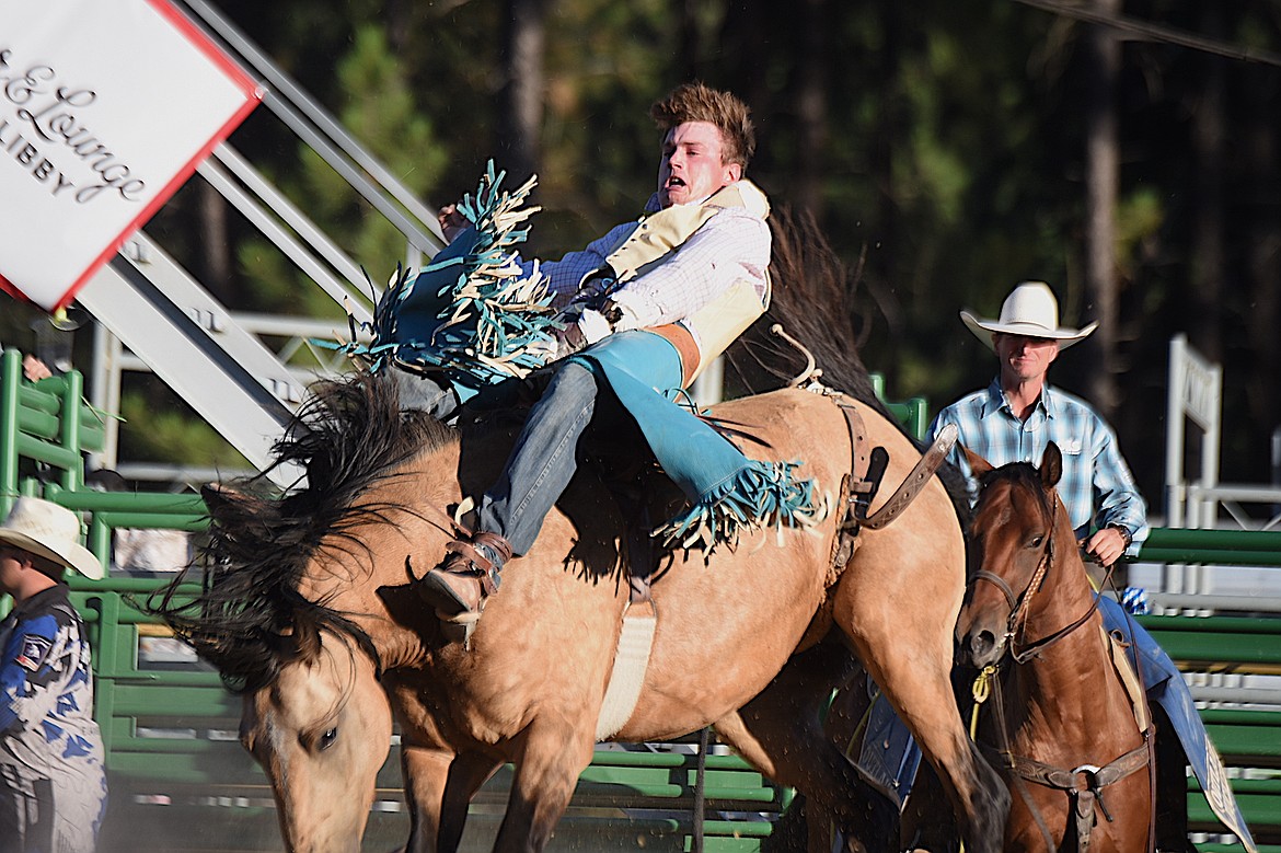 Ronan's Trapper McAllister competes in the bareback riding event Friday, July 25, 2025, at the Kootenai River Stampede in Libby. (Scott Shindledecker/The Western News)