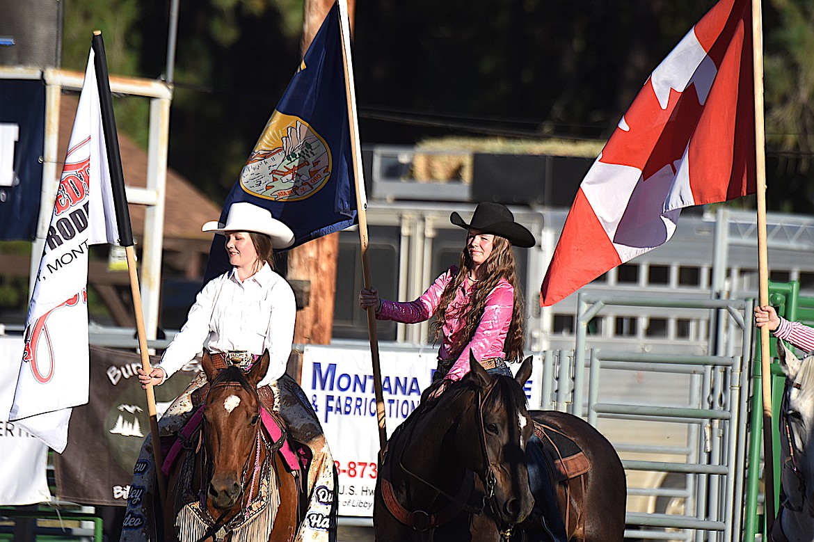 Brianna Bailey displays the Montana state flag Friday, July 25, 2025, at the Kootenai River Stampede in Libby. (Scott Shindledecker/The Western News)