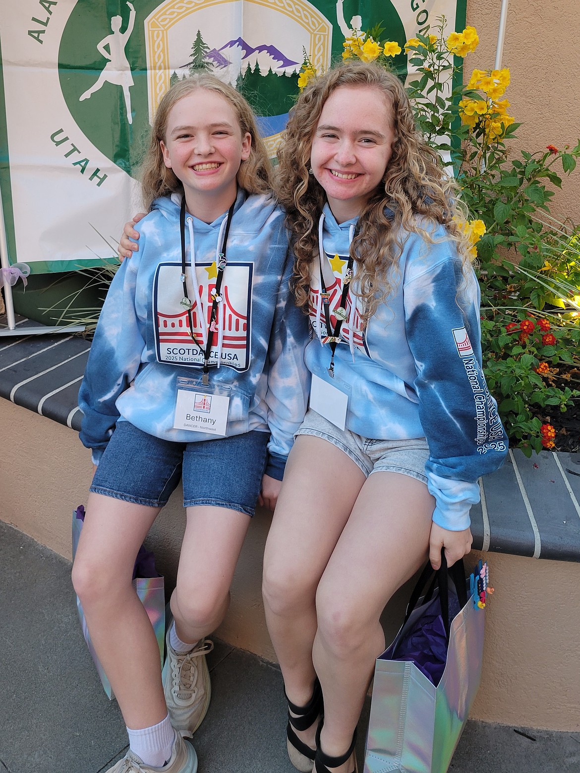 Sisters Bethany and Talie Hawkins, accomplished Scottish Highland dancers, pose for a photo.
