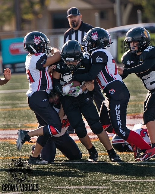 During a game from last season, a Jr Mav player pushes through the Othello defensive line. The program is open to grades K-8 with registration open until Aug. 16.