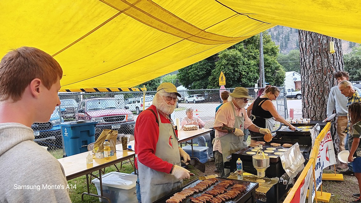 Charlie Quick was at the end of the Methodist Men’s Breakfast chow line making sure patrons had utensils, napkins and cups for coffee and juice. This breakfast is one of the oldest traditions of the Mineral County Fair each morning. (Monte Turner/Mineral Independent)