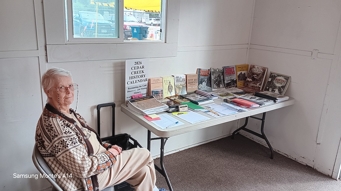 Kay Strombo with the Mineral County Historical Society and Museum was selling not only all of the books they have on the history of the county, but the 2026 calendars they had made as a fundraiser that show each history sign at the stops made to the Gildersleeve Mine. That trip is scheduled for Saturday, September 6 and reservations are being taken at (406) 822-3543. The excursion is free with transportation provided asking that patrons bring a side dish for the potluck up at the mine. (Monte Turner/Mineral Independent)