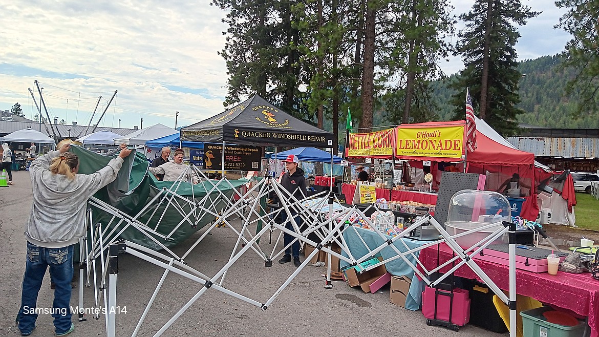 The wind from the thunderstorm Thursday night destroyed a couple of vendor canopies but thankfully Friday morning they found replacement covers. (Monte Turner/Mineral Independent)