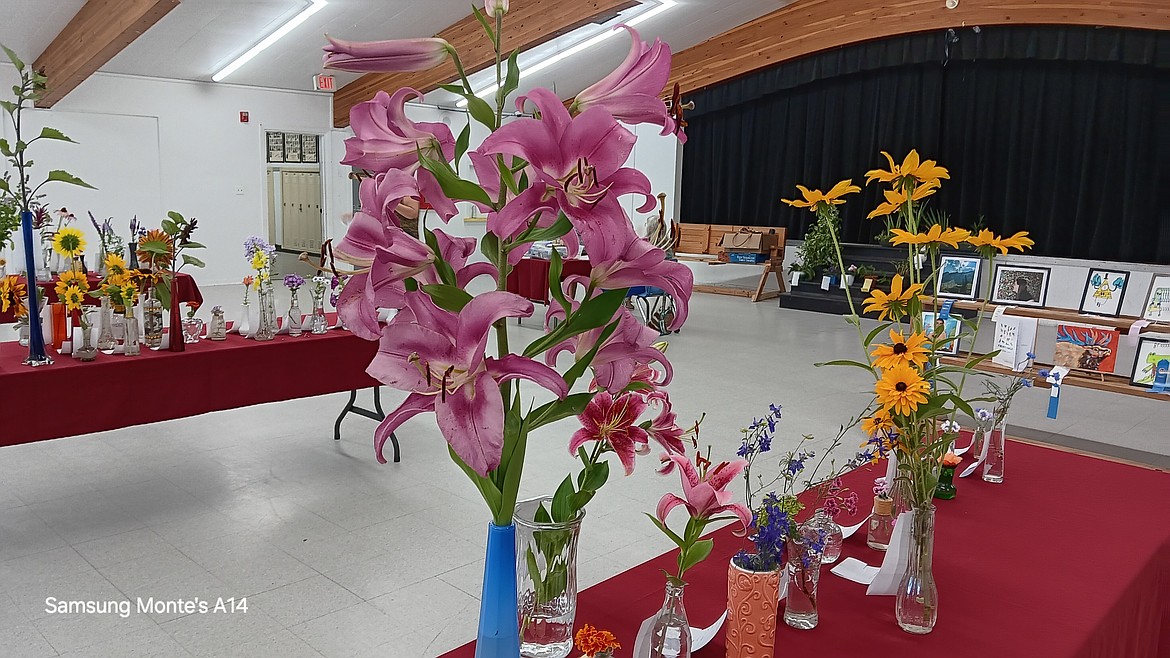 The floral entries were staged in the multipurpose room of the Superior High School this year as the cooler temperature kept them looking pristine longer for judging and spectators. (Monte Turner/Mineral Independent)