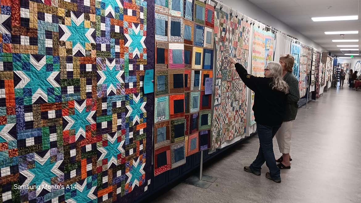 The Cabin Fever Quilters Guild held in the Superior High School is a mainĀ draw every year and people can win raffle prizes and judge for Best in Show, which is nearly impossible with the artistic quality displayed. (Monte Turner/Mineral Independent)