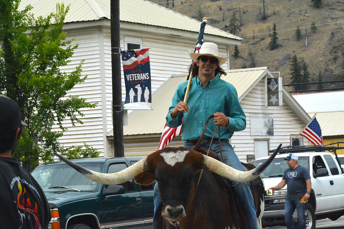 There is nothing quite like seeing rodeo clown, Danger Dave, riding a longhorn down River Street in Superior. (Mineral Independent/Amy Quinlivan)