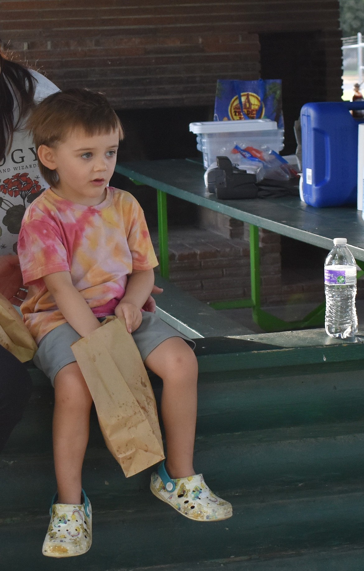 Tate Bell eats some popcorn that was given out during Ritzville’s National Night Out. Tate said he was excited to watch the movie National Treasure later that evening.