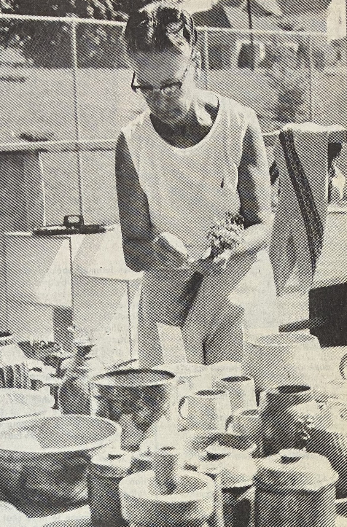 Elsa Shern of Twin Lakes arranges dried flowers for the Outdoors Arts & Crafts Festival at McEuen Field (now known as Art on the Green) in 1970.