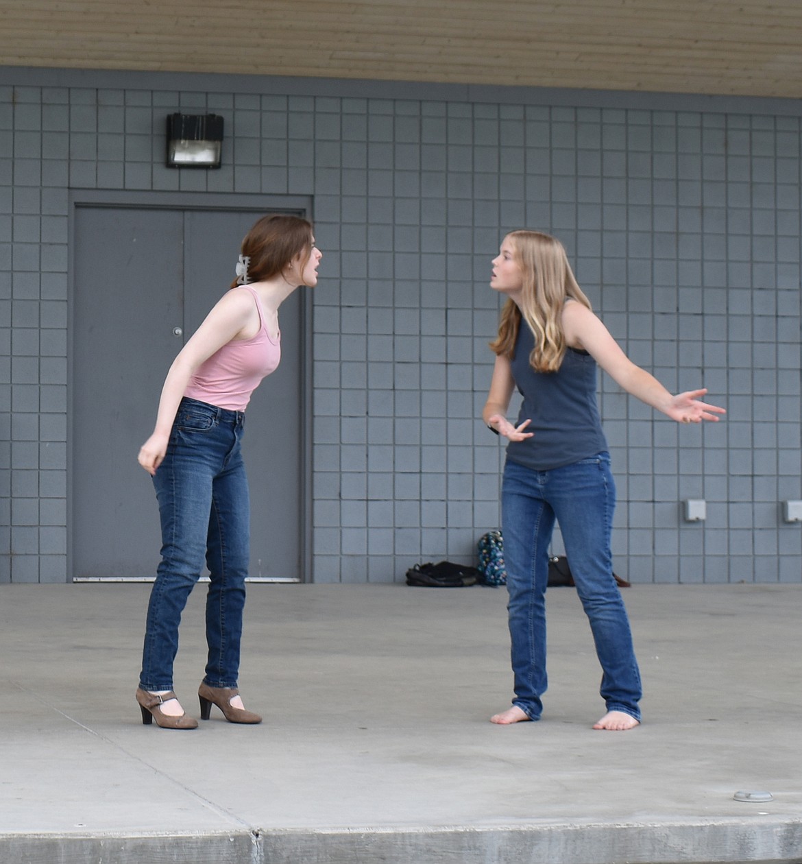 Grandma (Avery Wittenbern) relives a memory of meeting a talkative cousin (Finley Wittenbern) in “In Grandma’s Basement.”