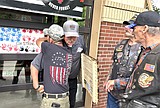 Veterans present wooden flag in honor of John Morrison, Frank Harwood