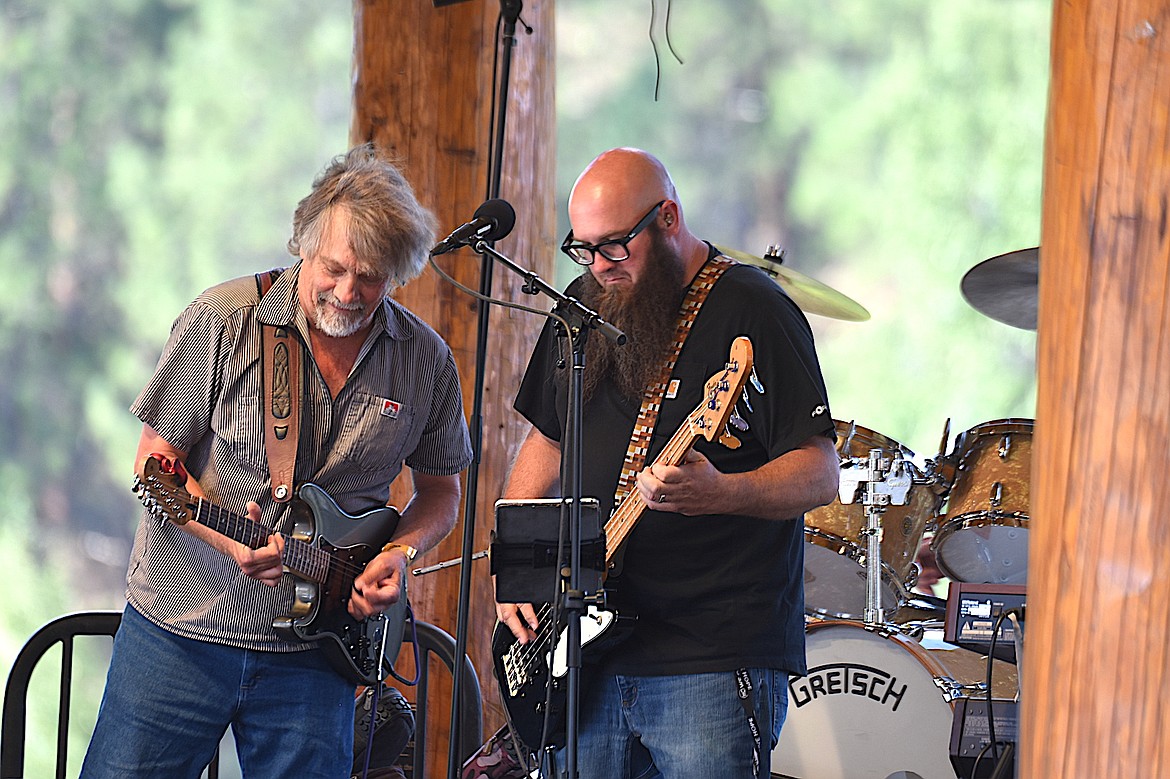 Kenny James Miller Band's Ken Sederdahl, left, and Mitch Melzer jam together Friday, Aug. 8, 2025, at Libby's Riverfront Blues Festival. (Scott Shindledecker/The Western News)