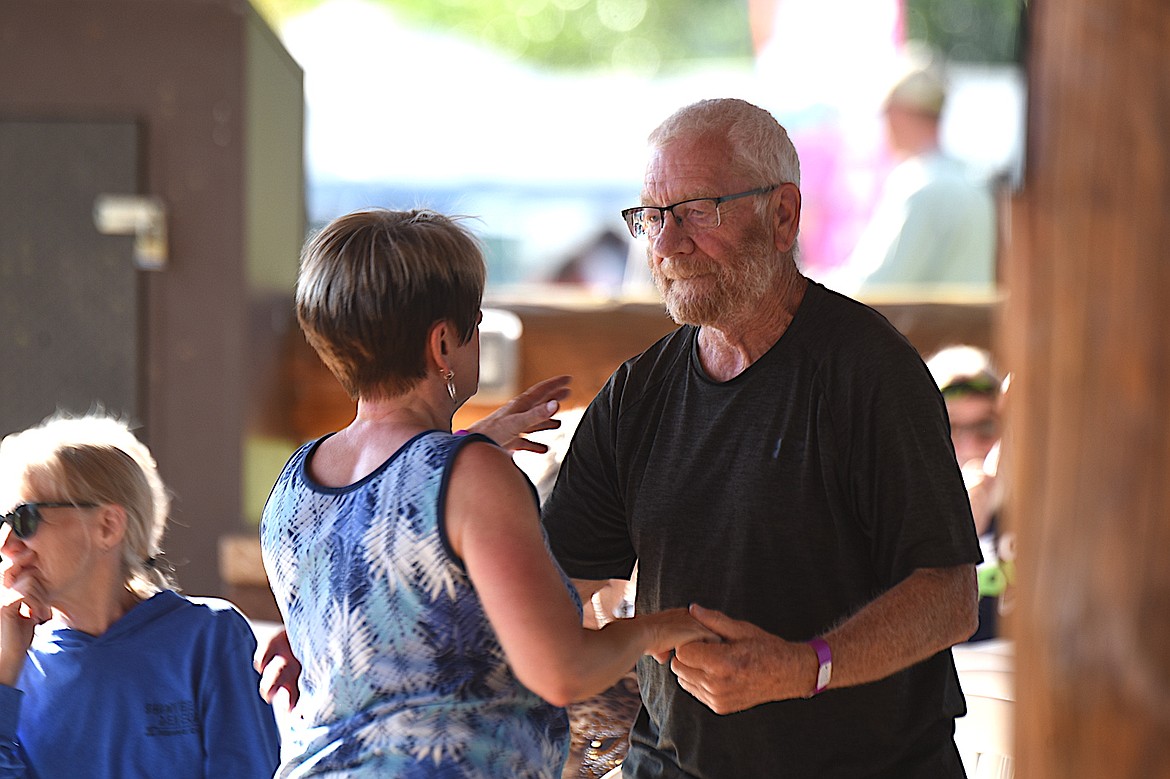 A couple enjoy a dance Friday, Aug. 8, 2025, at Libby's Riverfront Blues Festival. (Scott Shindledecker/The Western News)
