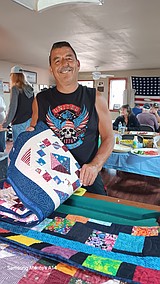 Guild delivers quilts to local veterans