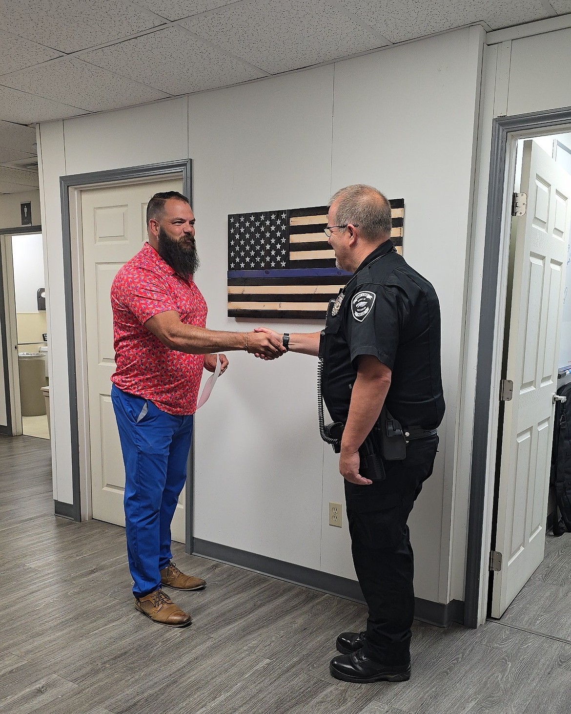 Patrick Canady, right, was sworn in as Soap Lake Police Department’s new chief Monday morning by Mayor Peter Sharp, left. Sharp said he is excited to have a permanent chief in place and looks forward to the work Canady will do.