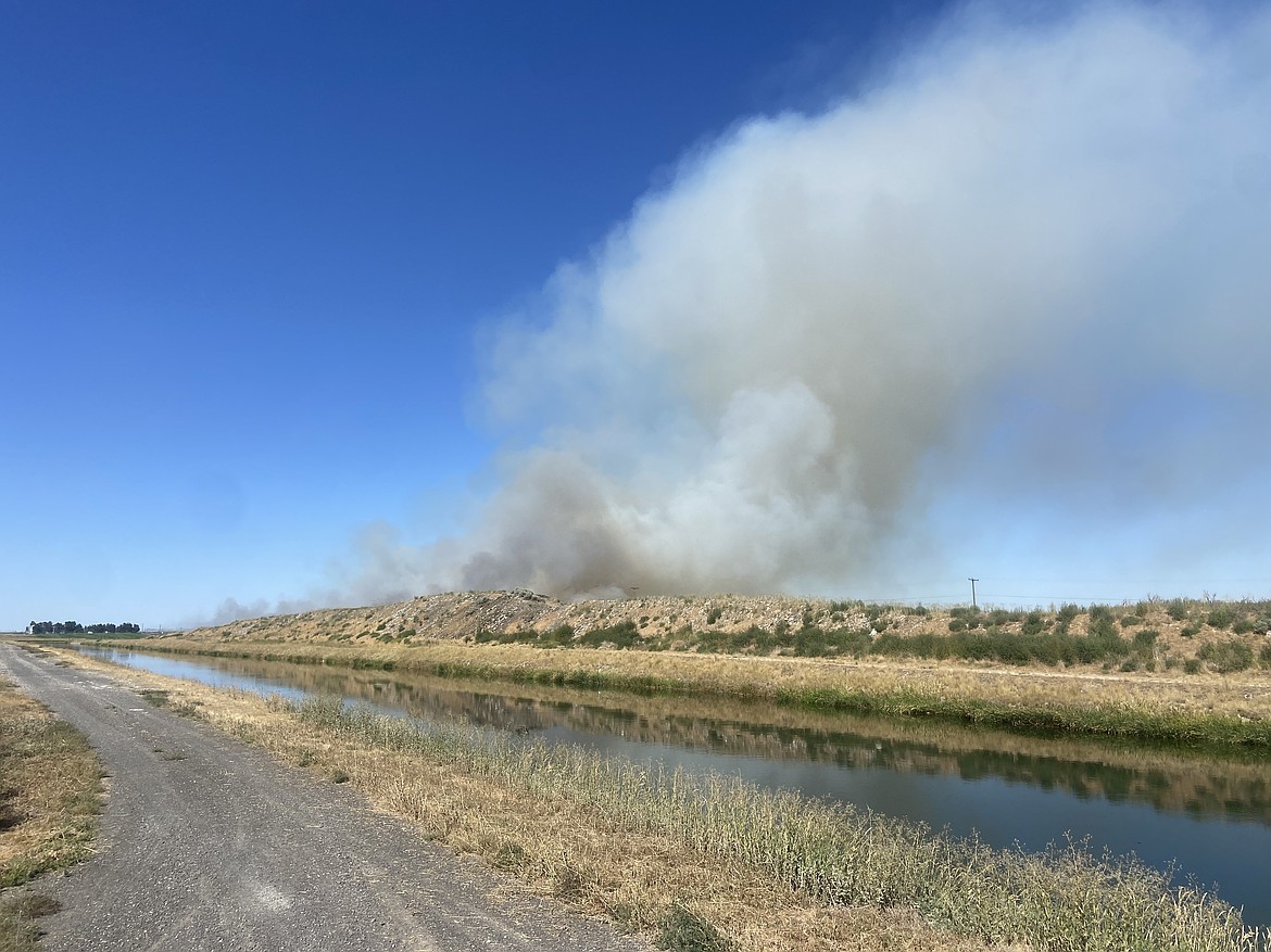 Two controlled agriculture burns are in progress around Moses Lake during Tuesday afternoon.