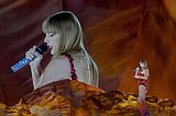 Taylor Swift's economic pull makes orange the new green for big brands