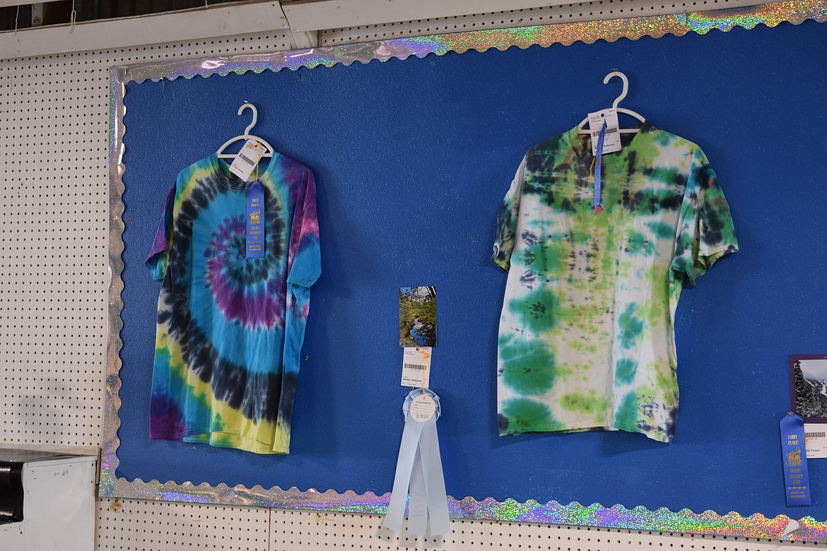 Boy Scouts and Eagle Scouts stay busy with a variety of projects throughout the year. While the traditional blue or khaki shirts with scarves may be the uniform most associated with them, a tie-dyed shirt for less formal occasions is also on the table. Scouts even put a competition into dying theirs just so.