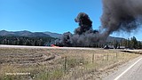 No injuries after van catches fire on I-90