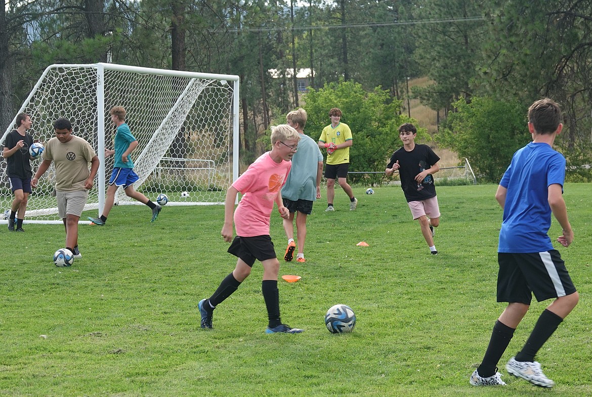 Thompson Falls-Plains-St. Regis boys soccer players during a drill in Thompson Falls Friday. (John Hamilon/VP-MI)