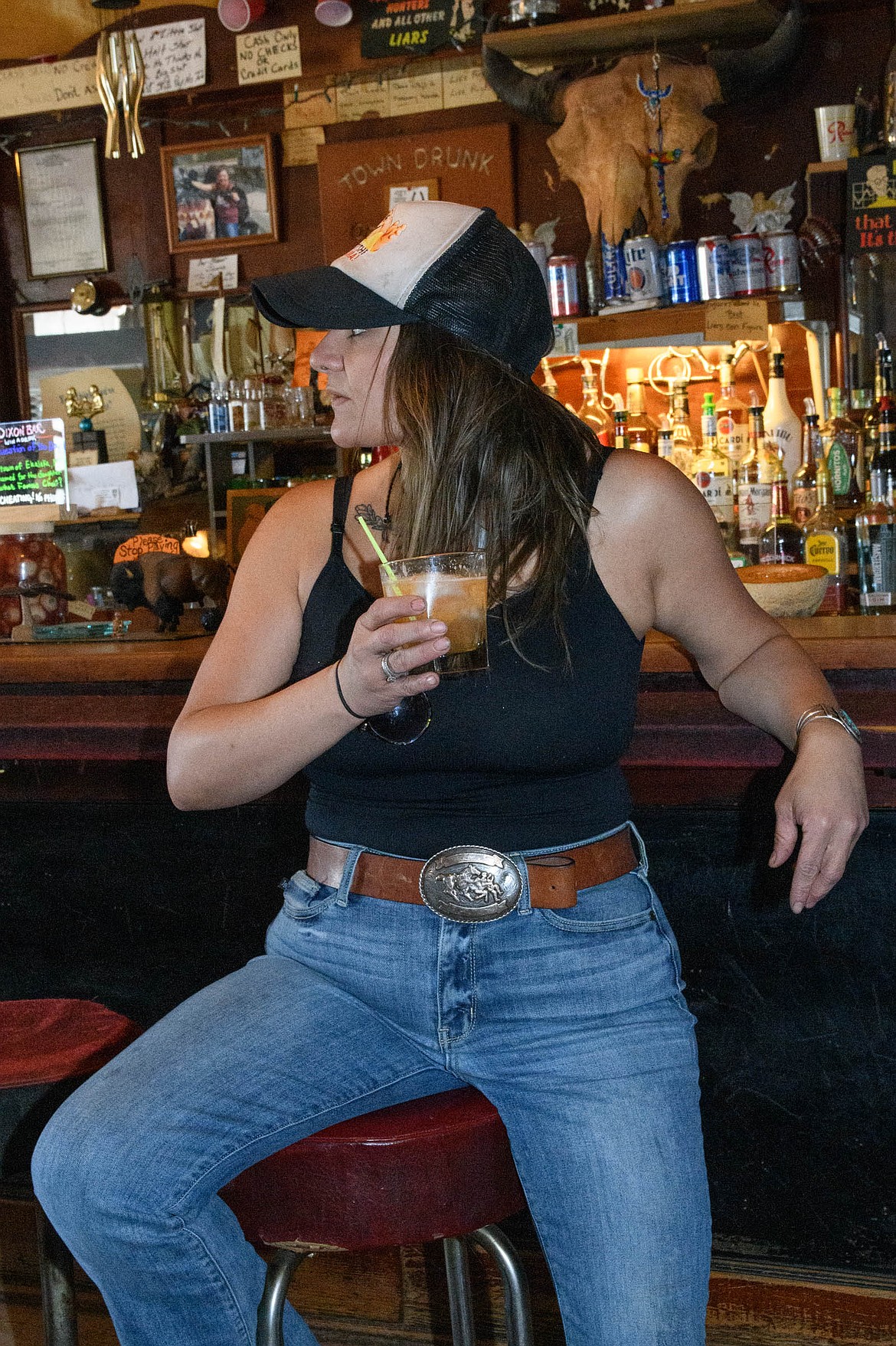 Theodora Steinke sits at the bar with a melon flavored drink on Aug. 16. A melon drink like this could be on the menu in the future. (Emily Messer/Leader)