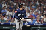 Turner, Harper power Phillies to 12-7 rout of Mariners