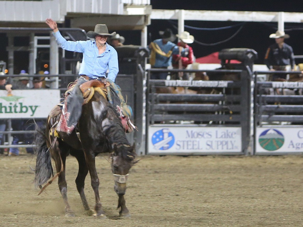 Jay McAllister goes for eight in bareback competition at the Moses Lake Roundup Rodeo.