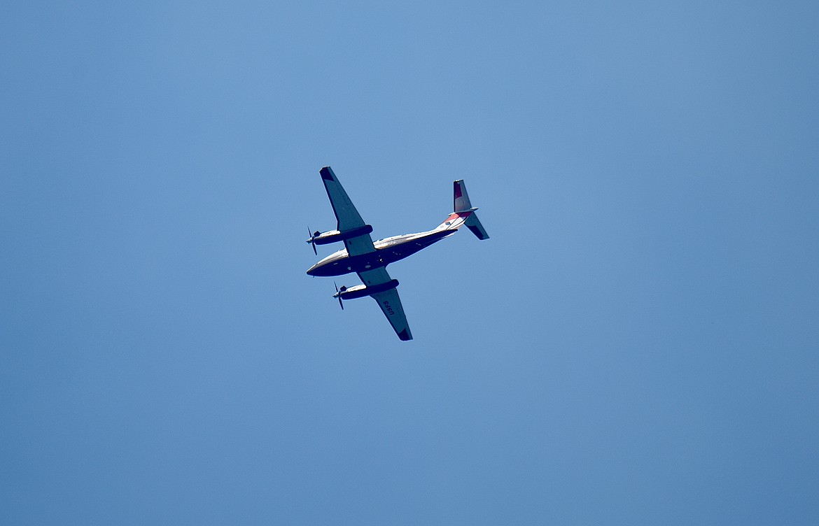 A spotter plane flies over the Ransome Creek Fire on the afternoon of Thursday, Aug. 21, 2025, in the Quartz Creek/Bobtail Ridge area. (Scott Shindledecker/The Western News)