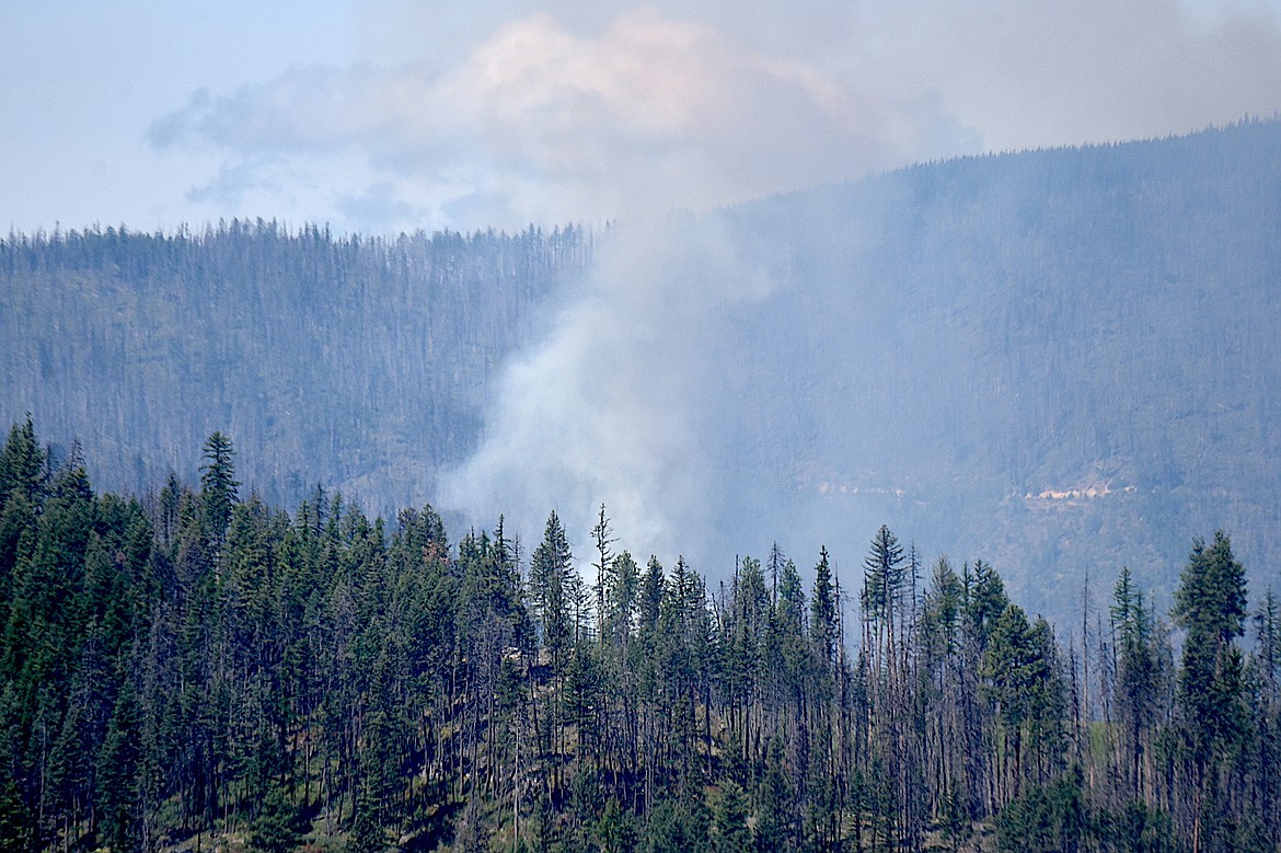 Smoke pours off the Ransome Creek Fire on the afternoon of Thursday, Aug. 21, 2025, as it burns through the remains of the 2017 West Fork Fire in the Quartz Creek/Bobtail Ridge area. (Scott Shindledecker/The Western News)