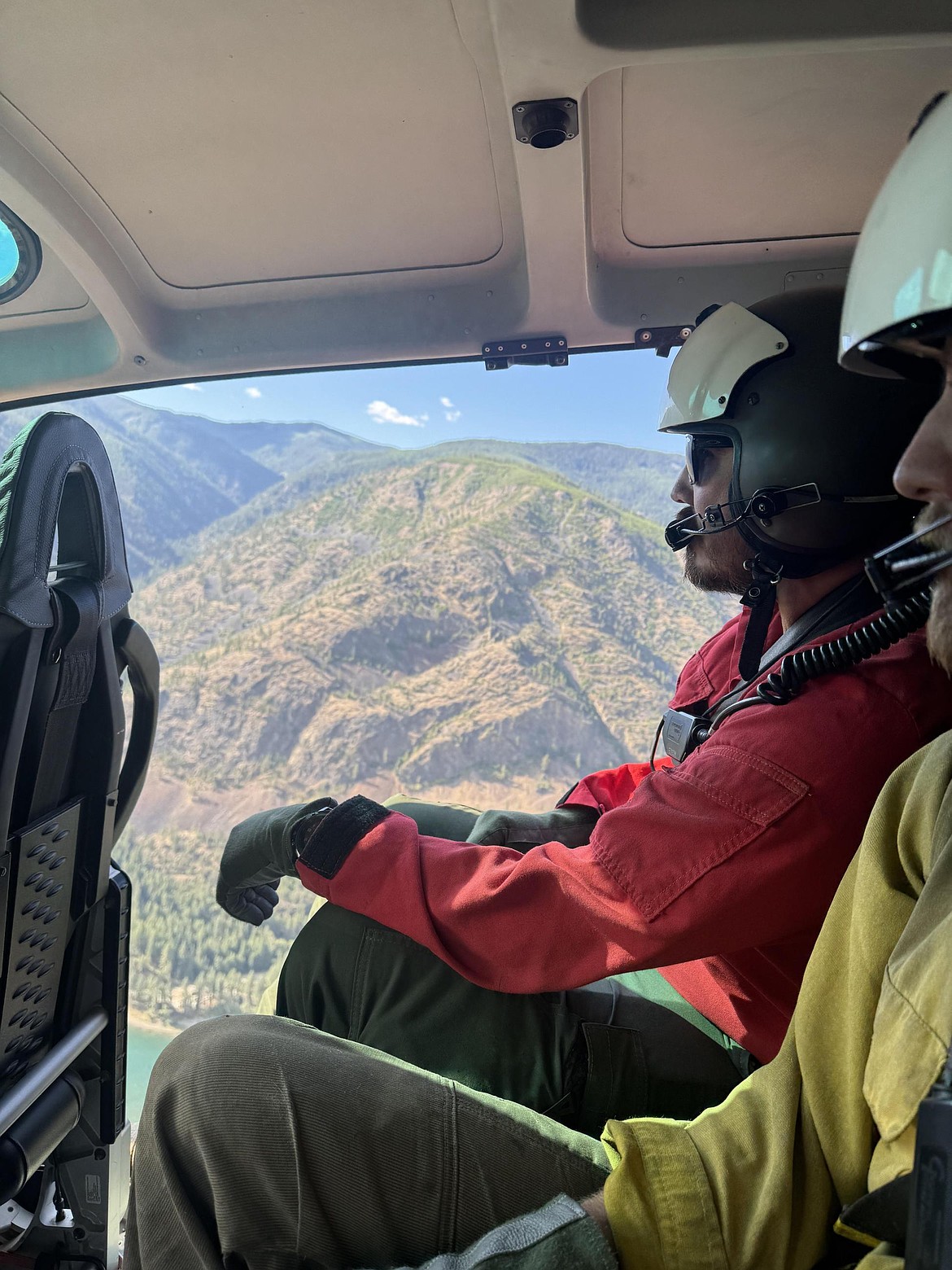 CSKT Division of Fire personnel joined aerial observation flights to assess fire behavior and terrain on the Knowles Fire in Sanders County on Aug. 21, 2025. (Inciweb photo)