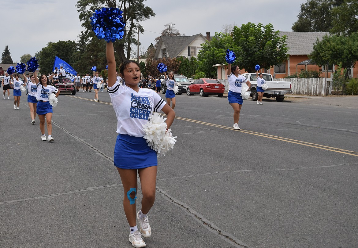 Warden High School cheerleaders perform on the streets of Warden during last year’s Community Days Parade.