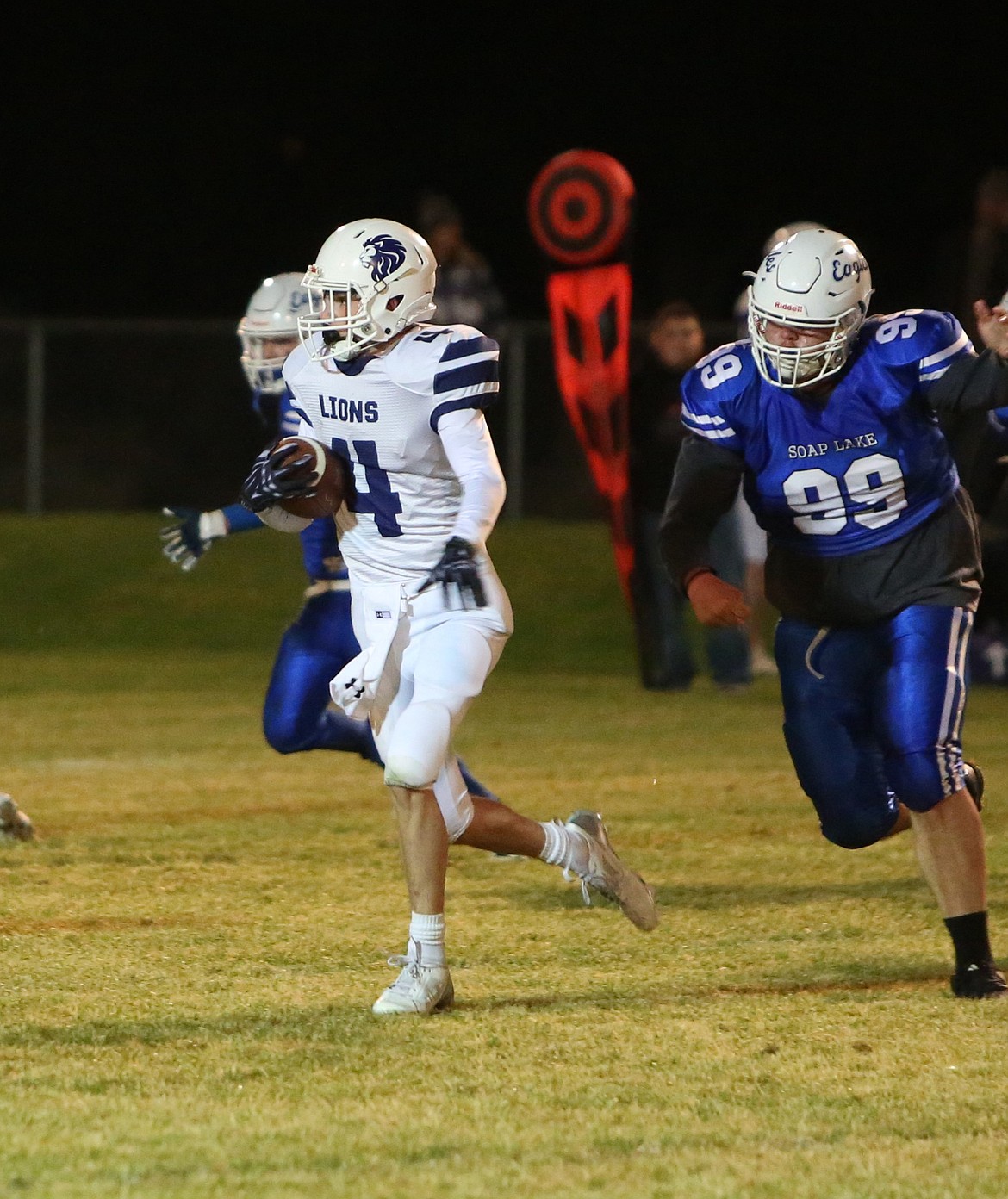 Treyson Kast evades a Soap Lake defender in a game last year. Kast returns to the team as a junior this year.