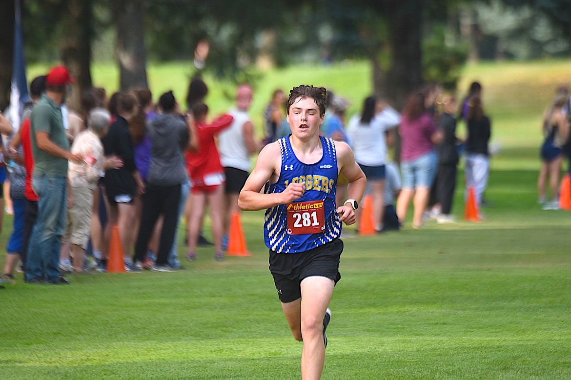 Libby junior cross country runner Cody Watson approaches the finish line Friday, Aug. 29, 2025, at the Libby Invitational at Cabinet View Golf Club. (Scott Shindledecker/The Western News)