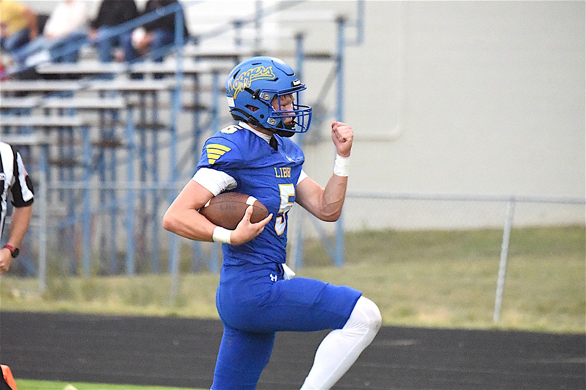 Libby Loggers quarterback Tristan Andersen runs into the end zone for one of his two rushing touchdowns during the game Friday, Aug. 29, 2025, against Browning. Andersen ran for two scores and threw for two more TDs in the first half. (Scott Shindledecker/The Western News)