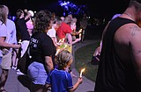 Candlelight vigil reminds community they're not alone