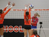 PREP VOLLEYBALL: Coeur d'Alene battles back, knocks off Post Falls in four