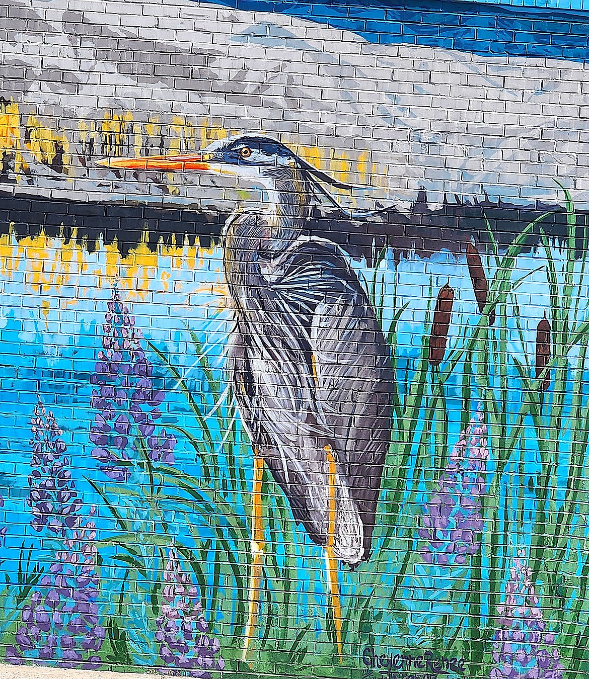 Cheyenne Renee's painting of a blue heron shows the bird in detail on the mural on 4th Ave. SW in Ronan. (Berl Tiskus/Leader)