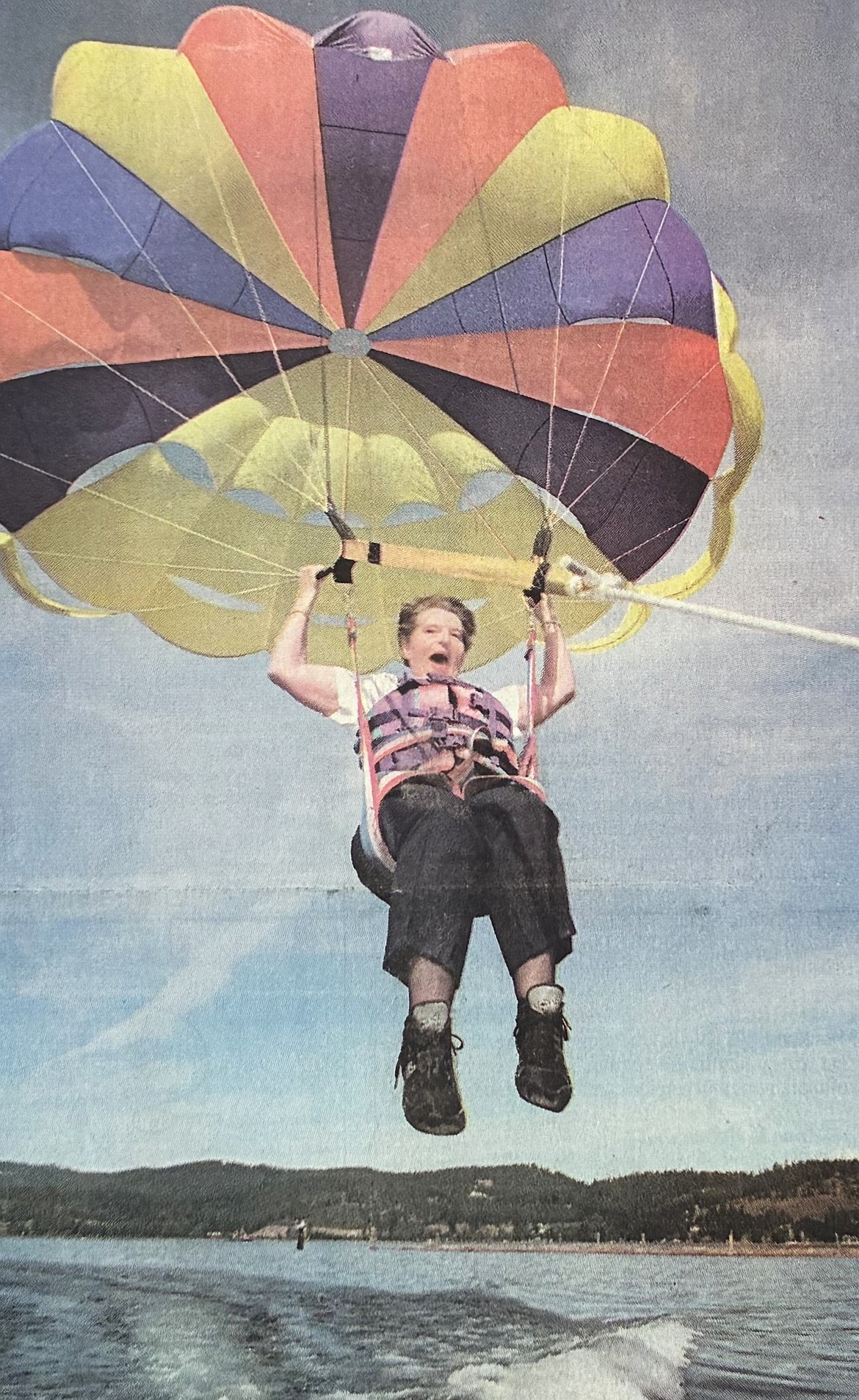 Lee Hartman celebrates her 50th birthday — and losing 108 pounds — by treating herself to a parasail ride in 1995.