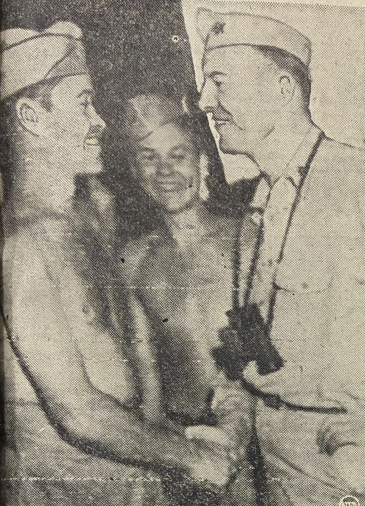 Maj. Greg (Pappy) Boyington is greeted after his POW prison release by Commander Stassen on the Mercy Ship Reeves in Tokyo Bay in 1945.