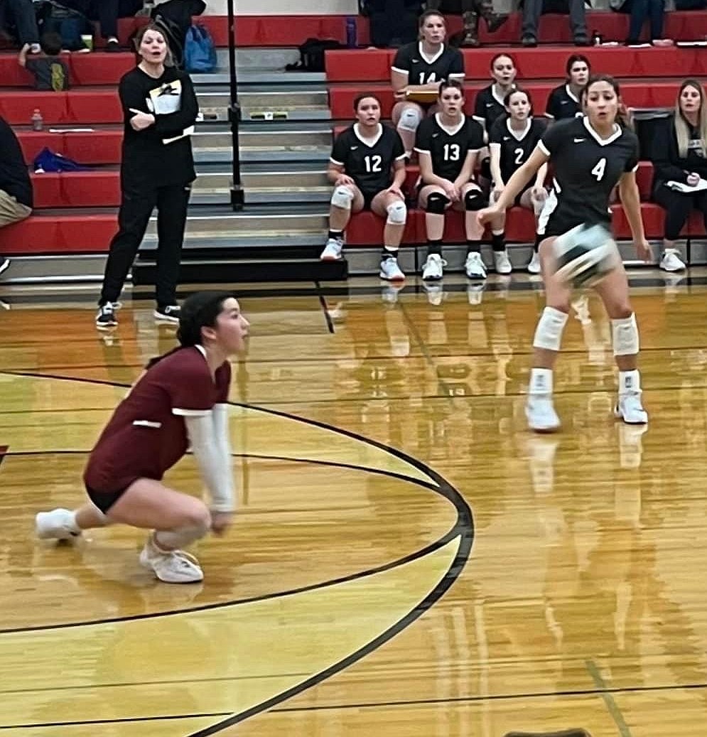 Warriors volleyball player Grace Okamoto dives for a pass during a game last season. Head Coach Katie Walsh said Okamoto will be the team's lead libero this season and is ready to step into a leadership role.