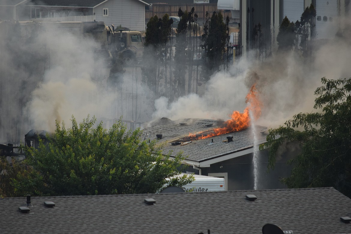 One house was fully scorched, and another had external damage in Ephrata after a wildland fire spread into the structures, according to Grant County Sheriff’s Office Public Relations Officer Kyle Foreman. The fire, as of 2 p.m. Thursday is in mop-up and no longer spreading.