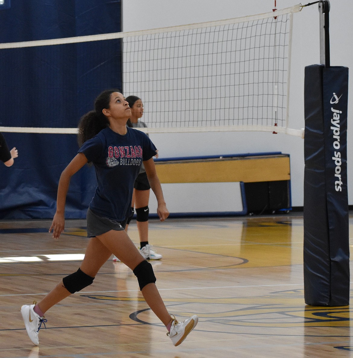 Lions senior SanTahna Ferguson prepares to spike the ball during a training drill at practice. Ferguson said she wants to instill a sense of pride in the team and leave a legacy with her younger teammates as she enters her final year with the team.