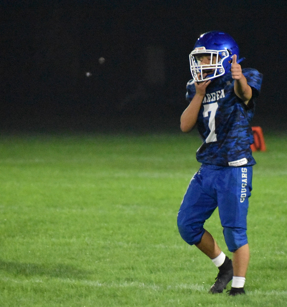 Cougars cornerback Luis Naranjo Cisneros gives a thumbs up to his coaches on the sideline during the second half against Medical Lake. The corner recovered a fumble made by the Medical Lake offense, which led to the Cougars scoring a touchdown of their own.