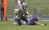 PREP FOOTBALL: Lake City falls victim to Wenatchee's trickery
