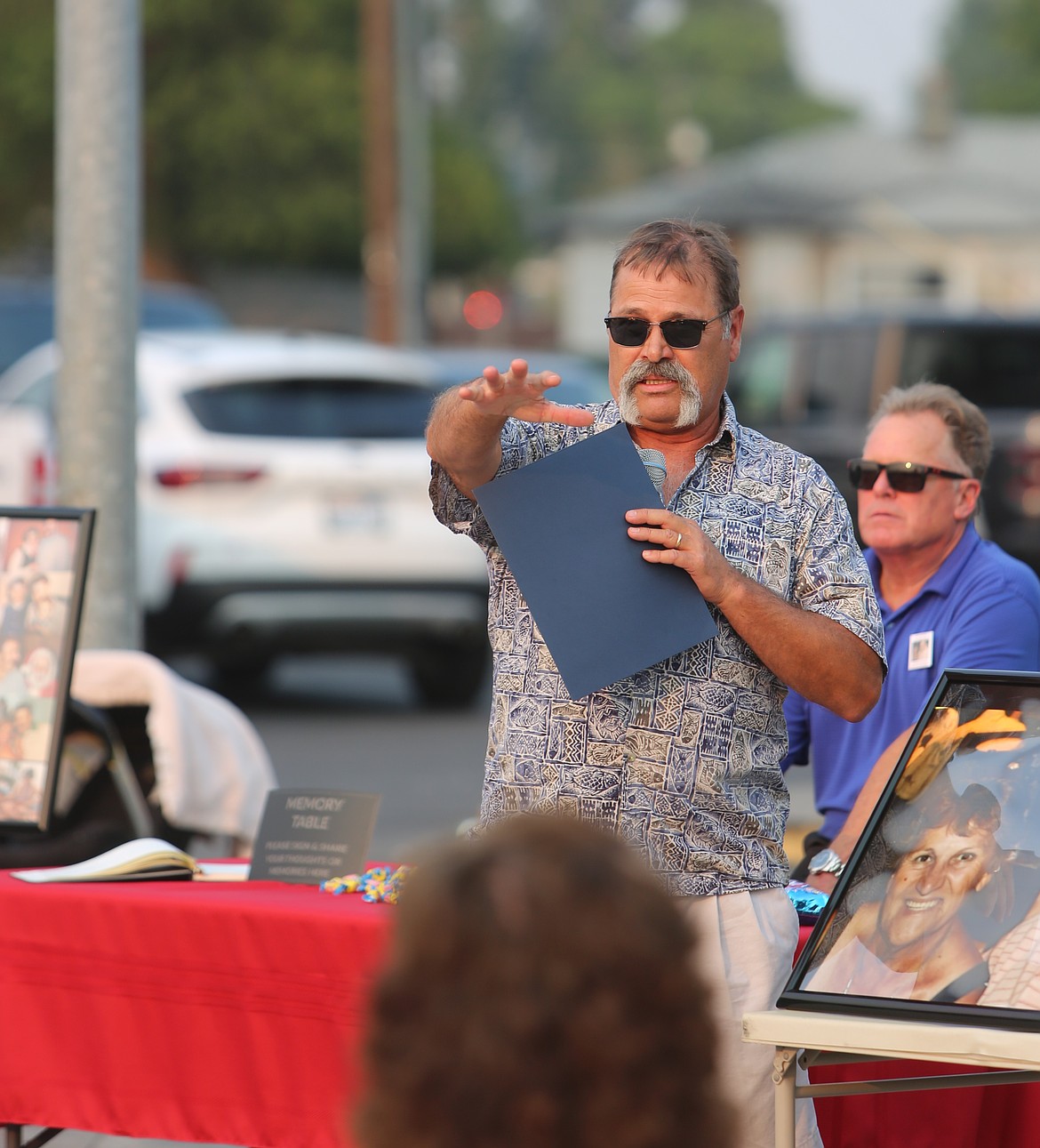 David Cunnington shares his personal memories of his parents at Friday's event. Each family member received copies of the document declaring Sept. 5 as Don and Mary Cunnington day.