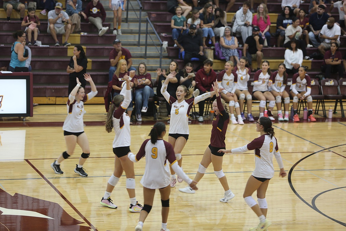 The Mavericks volleyball team celebrates after scoring a point against Hermiston Saturday. Moses Lake won 3-1.