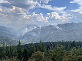 Crews gain ground on area fires