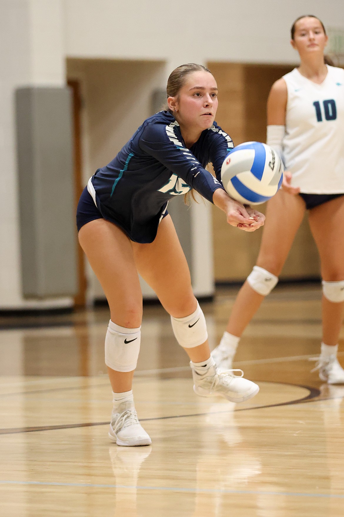 JASON DUCHOW PHOTOGRAPHY
Lake City senior Sofia Peressini plays a ball up Tuesday night against Sandpoint at Lake City.