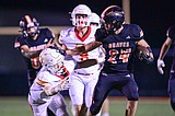 PHOTOS: Flathead and Missoula Hellgate clash delayed by lightning again