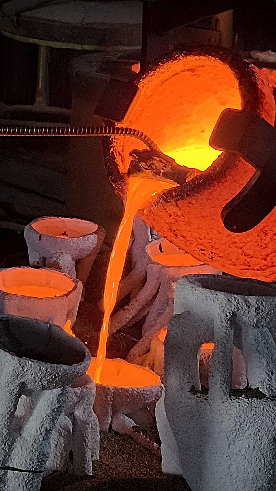 Molten bronze being poured in molds at the Kalispell Art Foundry. (Photo courtesy of Amanda Markel)