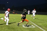 Unbelievable ending ... Matthews takes slant pass to end zone as Trojans clip Eastmont in final seconds